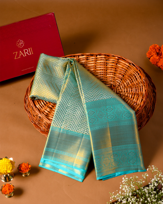 Pastel Blue Pure Tissue Silk Saree with Lotus Motifs & Rich Pallu