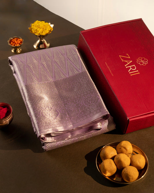 Pastel Purple Pure Tissue Silk Saree with Diamond Motifs and Rich Pallu