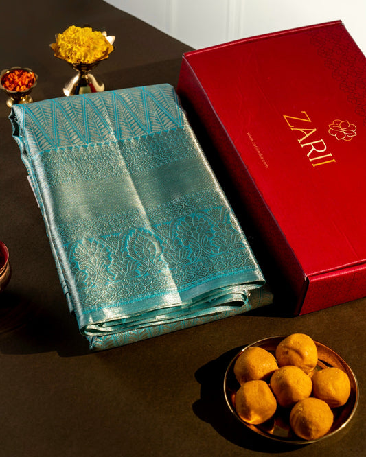 Pastel Blue Pure Tissue Silk Saree with Diamond Motifs and Rich Pallu