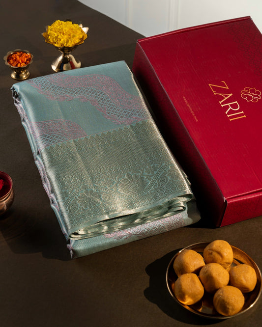 Light Green Pure Tissue Silk Saree with Floral Wave Motifs in Neem Zari
