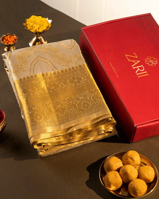 Silver Pure Tissue Silk Saree with Gold Border and Contemporary Motifs