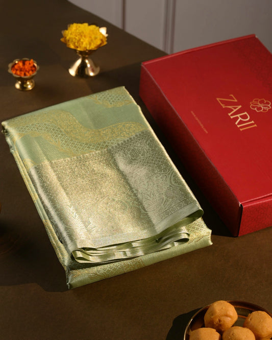 Light Green Tissue Silk Saree with Floral Wave Motifs in Gold Zari and Silver Border