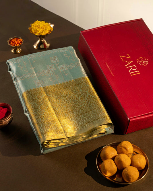 Pastel Blue Pure Tissue Silk Saree with Silver Geometric Weave and Gold Border