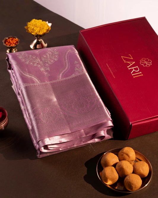 Pastel Pink Pure Tissue Silk Saree with Silver Zari and Unconventional Floral Motifs