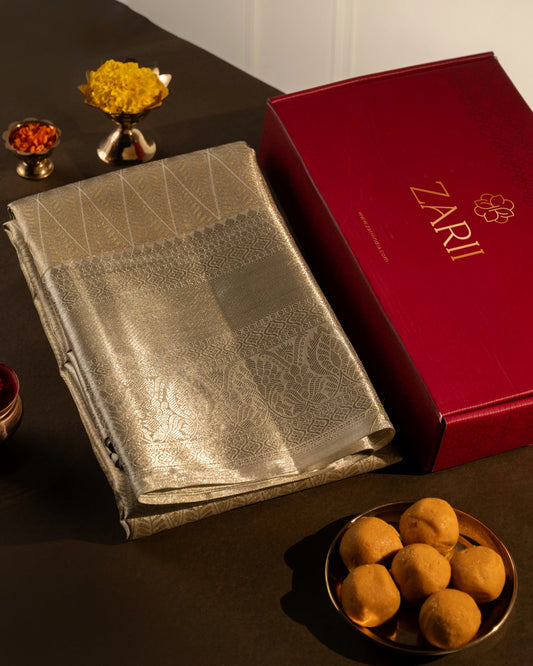 Light Gold Pure Tissue Silk Saree with Diamond Motifs & Rich Pallu