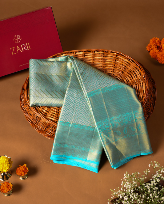 Pastel Blue Pure Tissue Silk Brocade Saree with Gold Zari & Rich Pallu