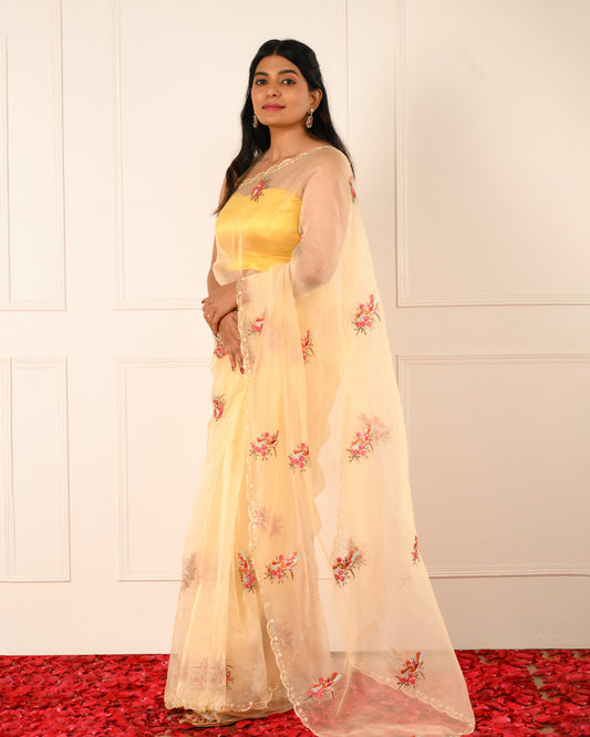 HUM – Butter Yellow Organza Saree with Floral Embroidery and Scalloped Pearl Border