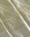 Pastel Green Pure Tissue Silk Saree with Light Gold Motifs and Silver Border