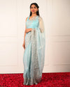 Nuraani – Blue Tissue Saree with Floral Thread Embroidery & Sequin Accents
