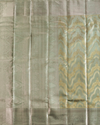 Pastel Green Pure Tissue Silk Saree with Light Gold Motifs and Silver Border