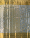Pastel Blue Pure Tissue Silk Saree with Geometric Floral Motifs and Gold Border