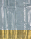 Pastel Blue Pure Tissue Silk Saree with Geometric Floral Motifs and Gold Border