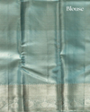 Light Green Pure Tissue Silk Saree with Floral Wave Motifs in Neem Zari