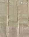 Silver Pure Tissue Silk Saree with Triangular Motifs and Neem Zari Accents