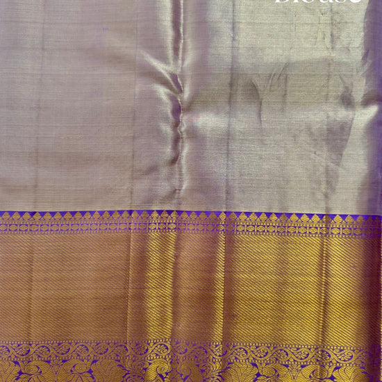 Silk blouse with a purple border and intricate design