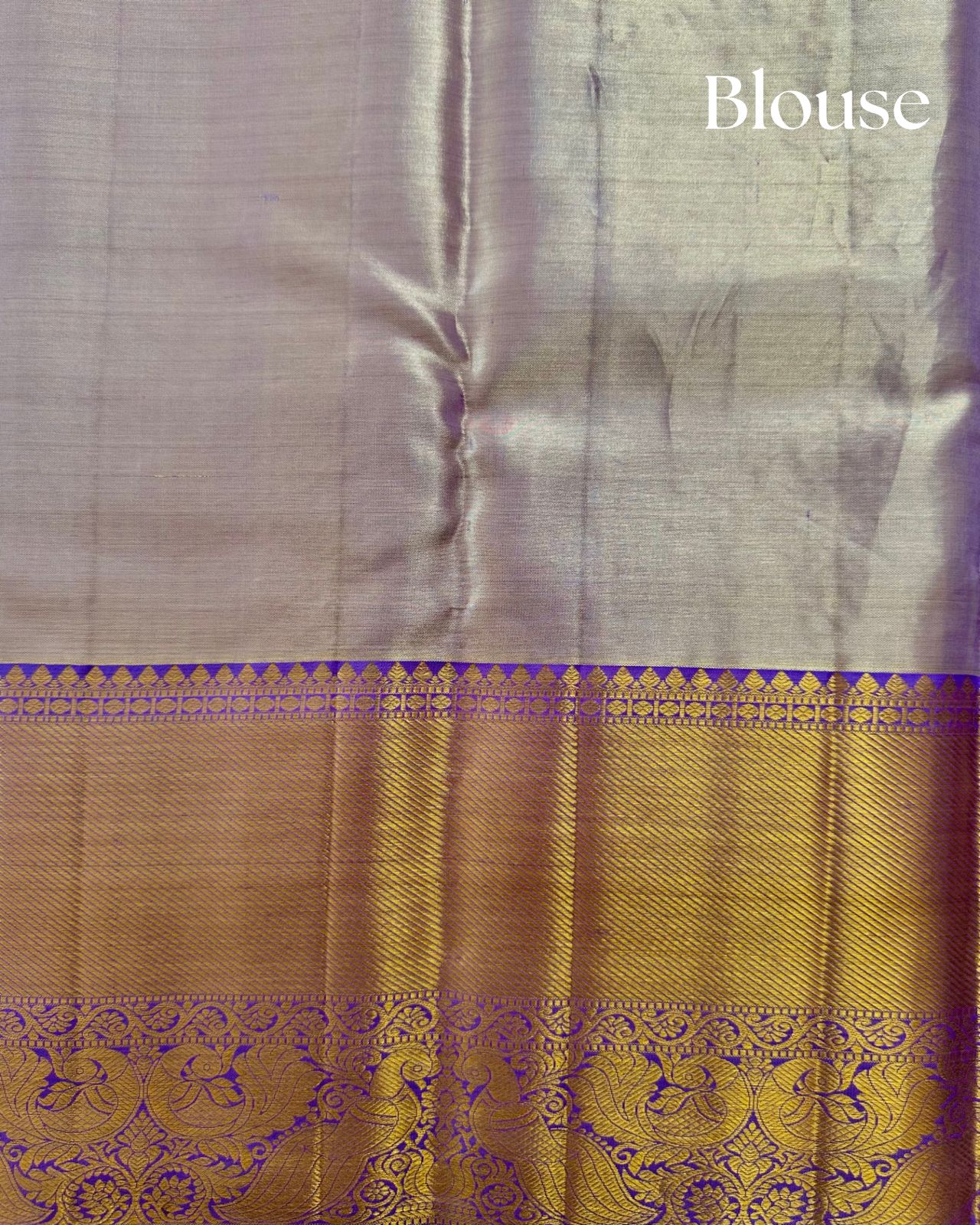 Silk blouse with a purple border and intricate design